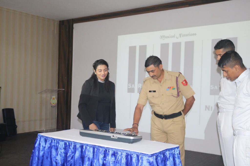 Officers participating in a music therapy exercise